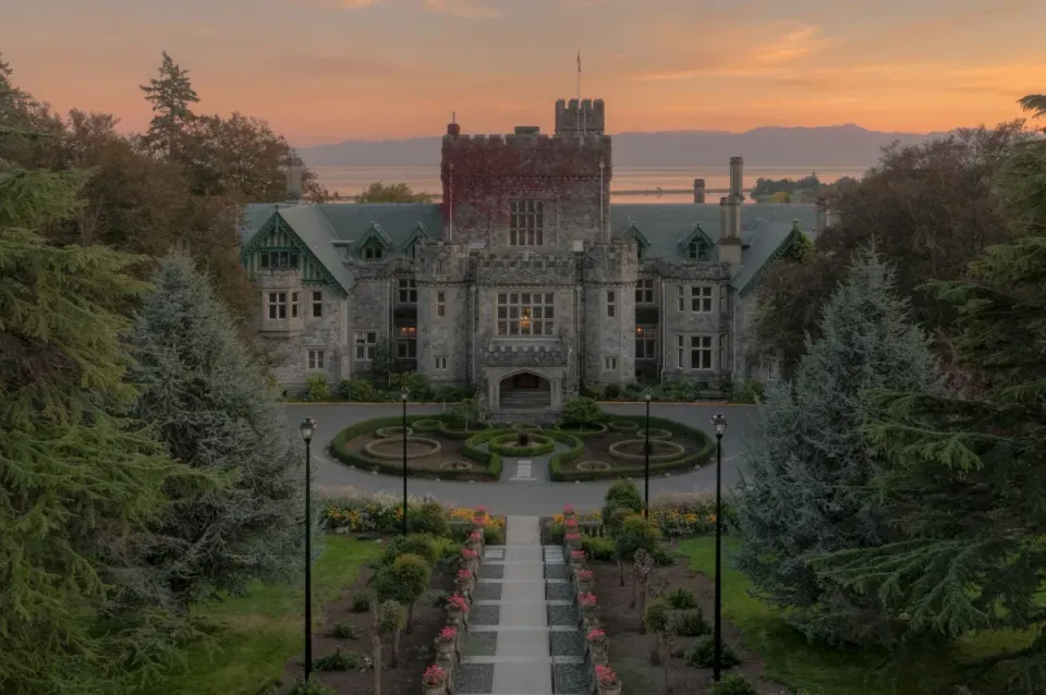 Hatley Castle and its formal gardens at sunset, Royal Roads, Colwood BC