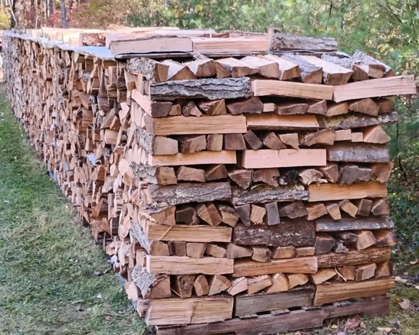 Seasoned firewood for the Malahat, BC: split firewood stacked high on a pallet